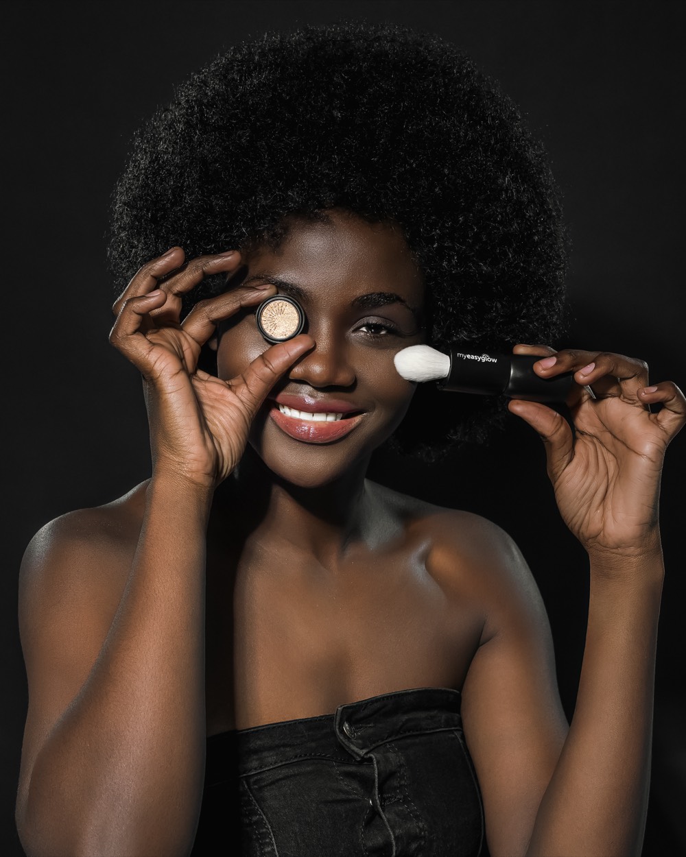 Leah Maelane beauty portrait with makeup brushes