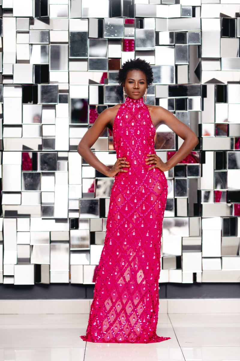 Pink sequin gown with mirror backdrop