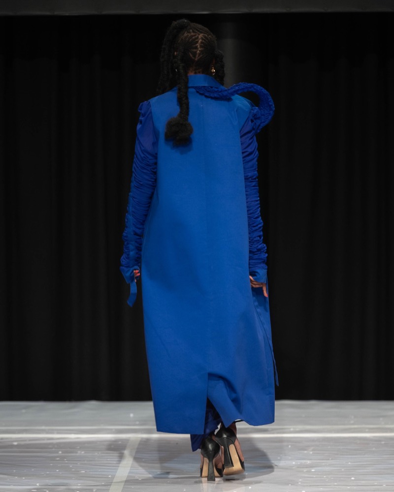 Blue coat runway back view