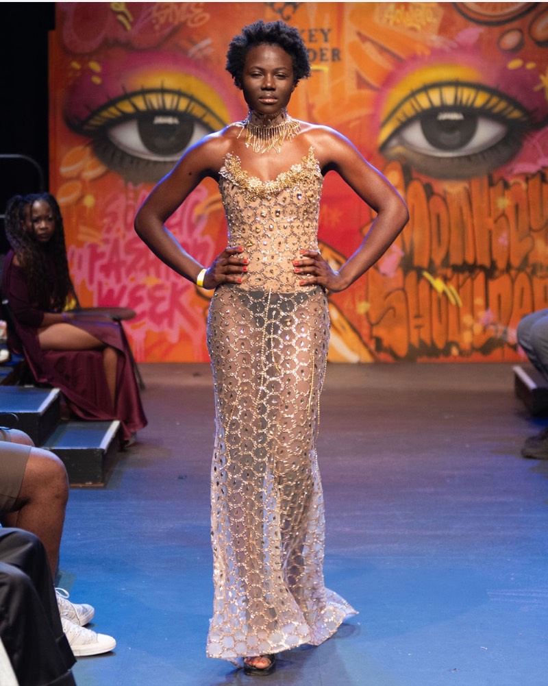 Gold mesh gown on the runway